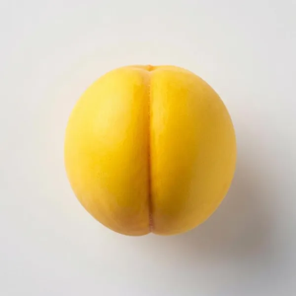 Peach, yellow, unpeeled, pitted, raw